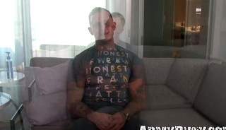 Buff military gay strips on the couch and jerks his dick off