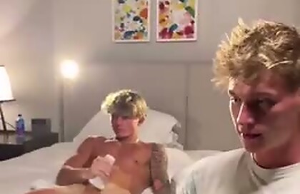 Two handsome hunks jerk off together