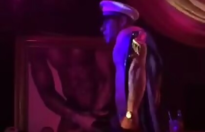 Muscular Guy Stripping Out Of A Police Uniform @ A Gay Strip Club