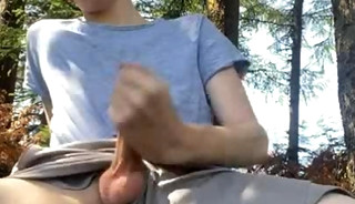 A gay teenager from Cologne, Germany, wanks his dick in the woods