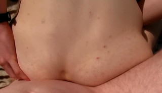 Cutesy young fellow tempted next to a field of flowers